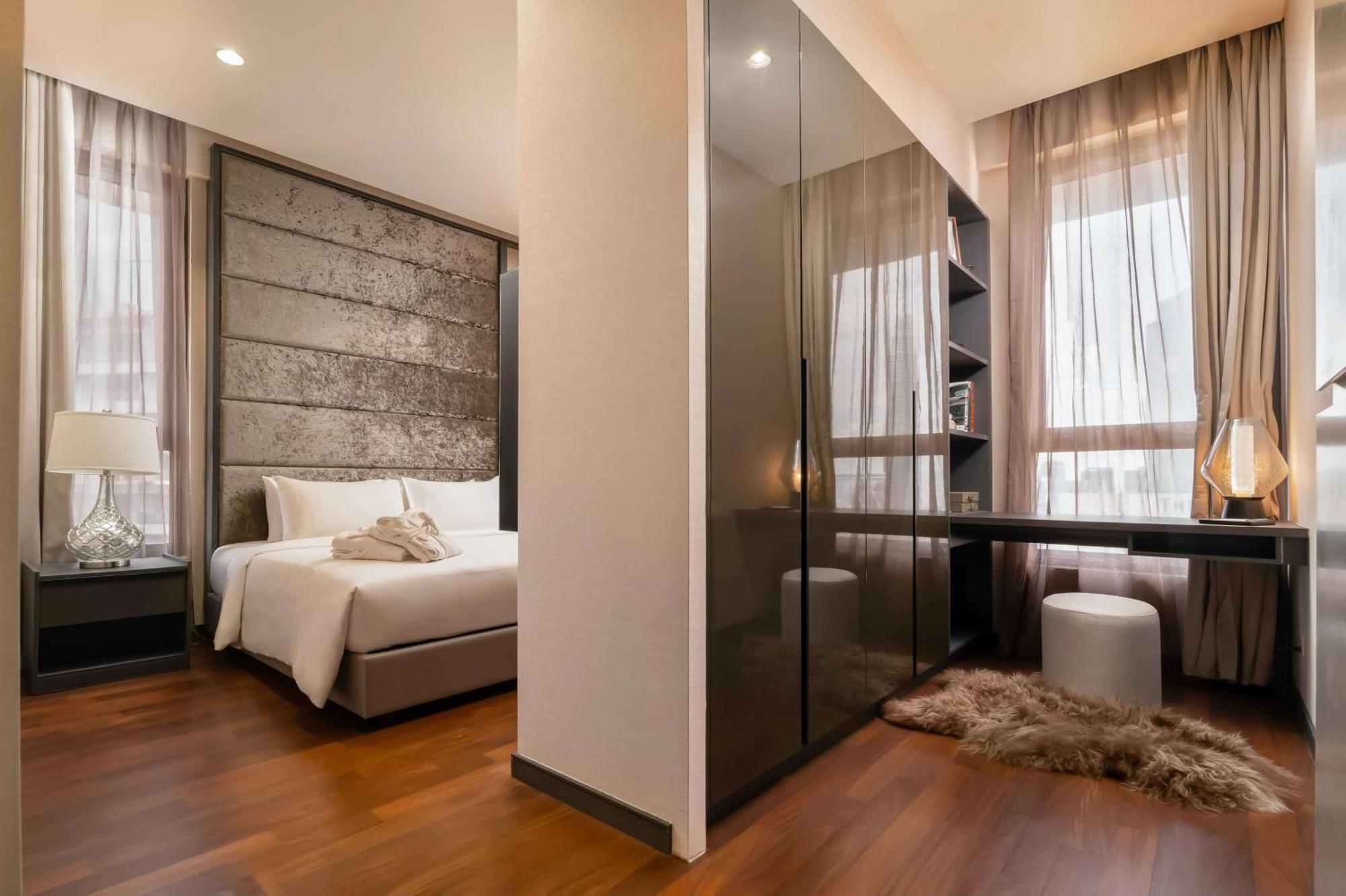 Wyndham Suites Klcc Kuala Lumpur Zewnętrze zdjęcie A bedroom in a condominium